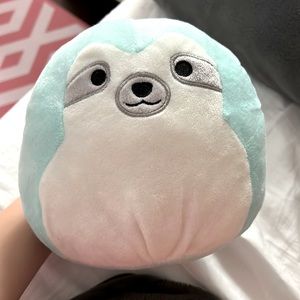 This is a teal stuffed animal it is so soft and amazing